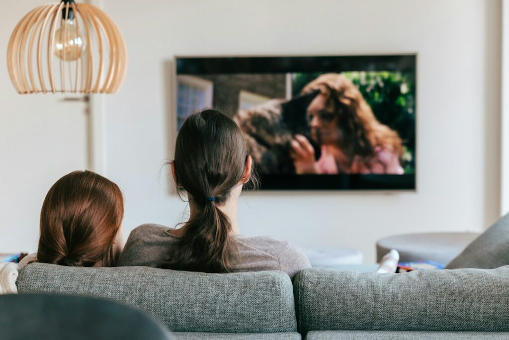 Illustrative home television scene, not Jessica Biel or a still from 7th Heaven.