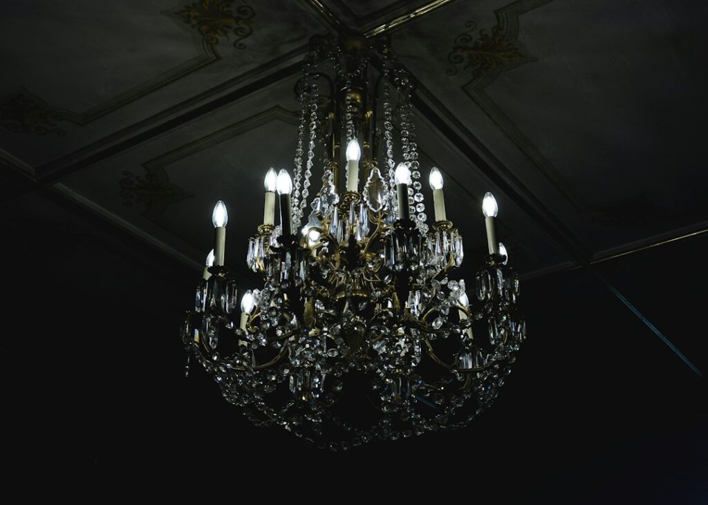 Elegant chandelier in a formal event space; not the 2026 amfAR Dallas gala