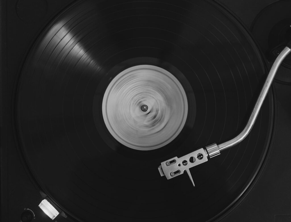 Turntable and vinyl record; not Amy Winehouse or album art
