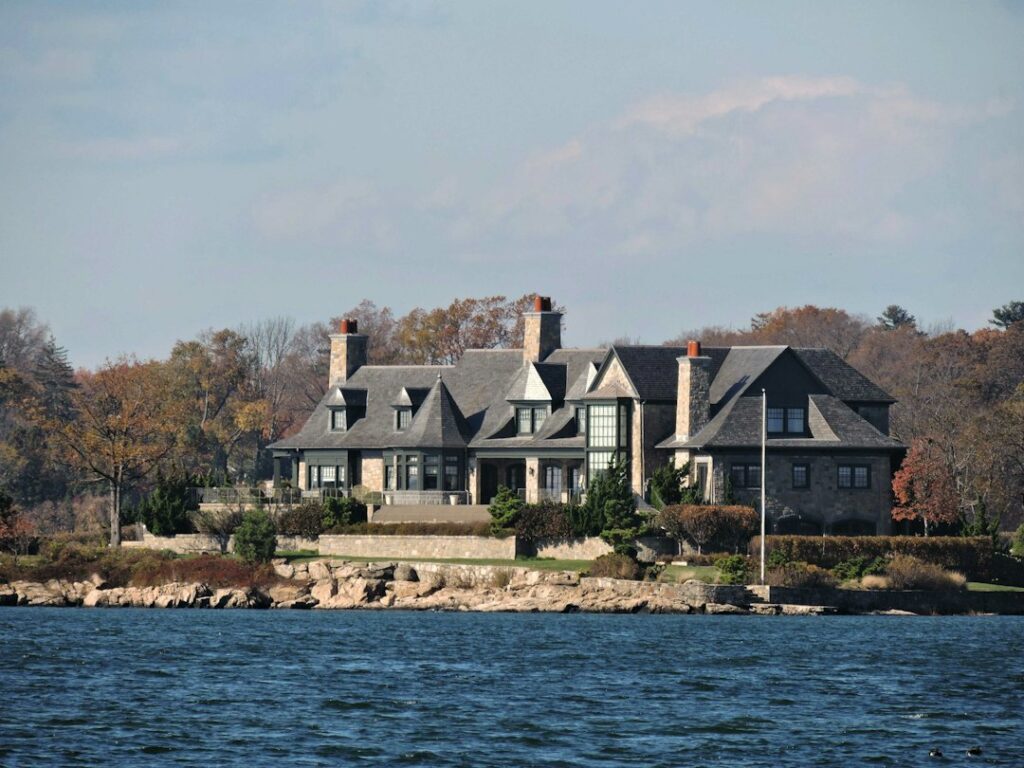 Illustrative waterside residence, not the fictional Storm family estate.